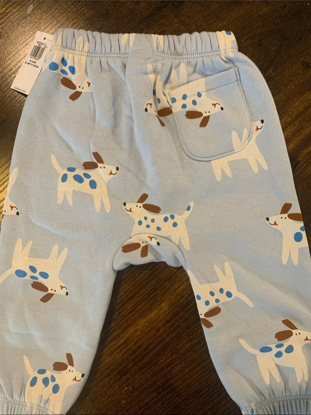 Old Navy Cream & Light Blue Footed One-Piece and Set with Penguins & Dogs